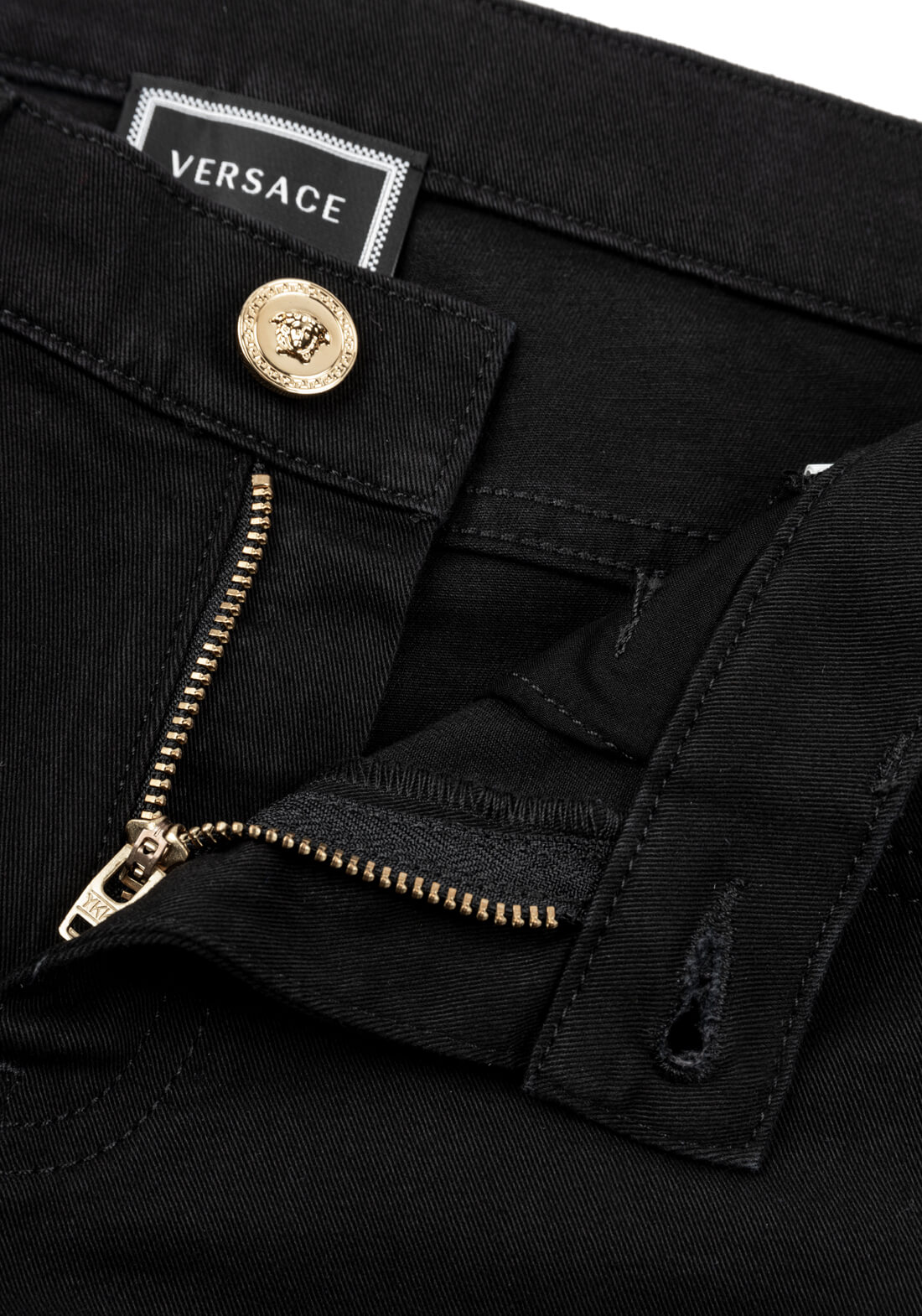 Джинсы Versace